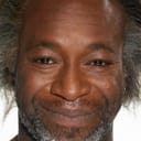 Urfé Koupaki als Taxi Driver (rasta)