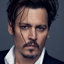 Johnny Depp als W. Eugene Smith