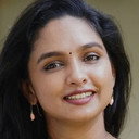 Vrindha Menon als Malini