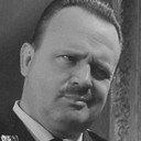 Guus Verstraete als Schiettenthouder Hugo Miermans