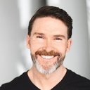 Rick Hughes als Business Guy