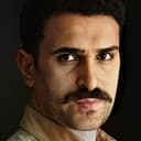 Mehmet Emin Kadıhan als Savaş Hoca
