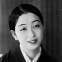 Toshiko Iizuka als Okan - Gonza's wife