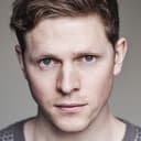 Scott Arthur als Young DC Paul Bethel