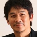 Tsuyoshi Ihara als Yoshinari Yonemori