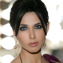 Nikita Anand als Akash Sarin's wife