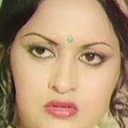 Padma Chauhan als Madam