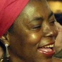 Lydia Ewandé als P.M.U. Customer