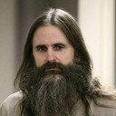 Brian David Mitchell als Self (archive footage)