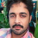 Manesh Krishnan als Krishnan