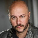 Kris Kozlowski als Henchmen Kraig