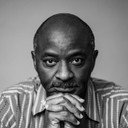 Tayo Aluko als Doctor Bassey