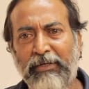 Amarendran Ramanan als Indian History Teacher