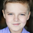 Rhys Slack als John Godfrey