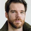 Gregory James Cohan als Doug Jones / The VelociPastor