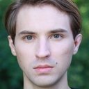 Bryan Benfield als Momus