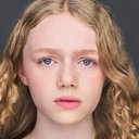 Vaughan Reilly als Nora