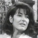 Dominique Lacarrière als La Secrétaire Dominique