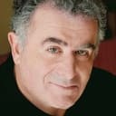 Saul Rubinek als John Woodman