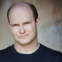Andrew Thacher als Immigration Officer