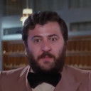 Γιώργος Μυλωνάς als hotel receptionist