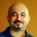 Anil Radhakrishnan Menon als Mario Benzo