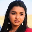 Deepthi Nambiar als Sanjana, Jagadish's younger sister