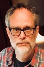 Foto retrato de Tom Case