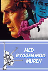 Med ryggen mod muren