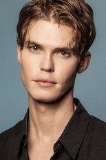 Erik Galli as Host in Under the Knife