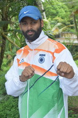 Ameer Vayalar as Taekwondo Coach in Trainer Sandy