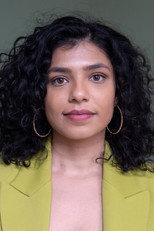 Charisa Chotoe as Host in Propaganda