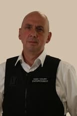 Mark King as Enforcement Agent in The Sheriffs Are Coming