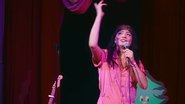 Backdrop of Melissa Villaseñor: Welp...What Now? image size 2250x1266