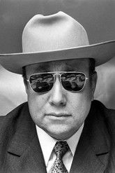 Photo of Jean-Pierre Melville image size 371x556