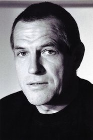 Lutz Teschner as Santos