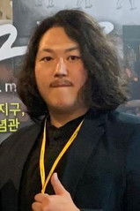 Lee Sung-min as Mr. Kim's Worker