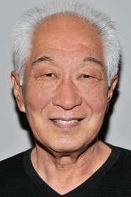 Michael Yama as The Dealer