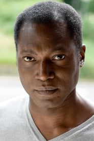 Aloysius Itoka as Herr M'Dengo