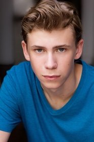 Owen Teague as Alec Travers