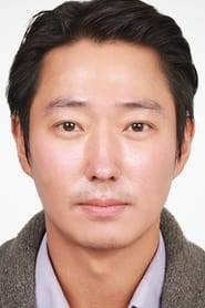 Lee Taek-geun as Past police