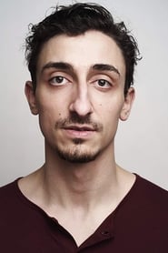 Martin Razpopov as Tattoo Gulag Inmate