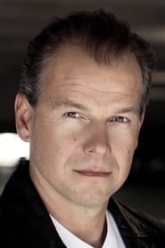 Peter Janov as KGB Agent