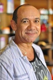 Frank Menezes as Evaristo Mateus Jr. (Júnior, Juneca Porpurina)