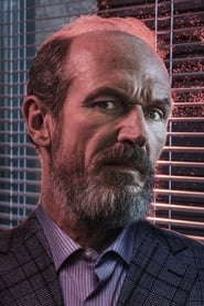 Toby Huss as Artie