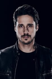 Peter Gadiot as Troy Falconi