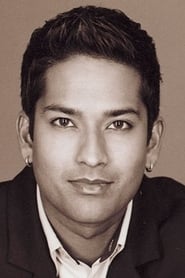 Darrin Maharaj as News Reporter