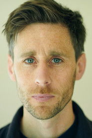 Ian Bonar as Q's Assistant