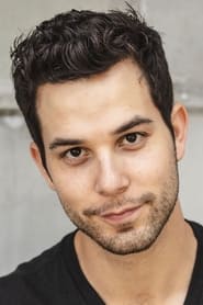 Skylar Astin is Professor James Morrow