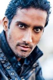 Karthik Srinivasan as Giles